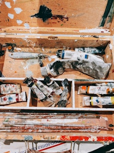 black and white labeled bottles on brown wooden table