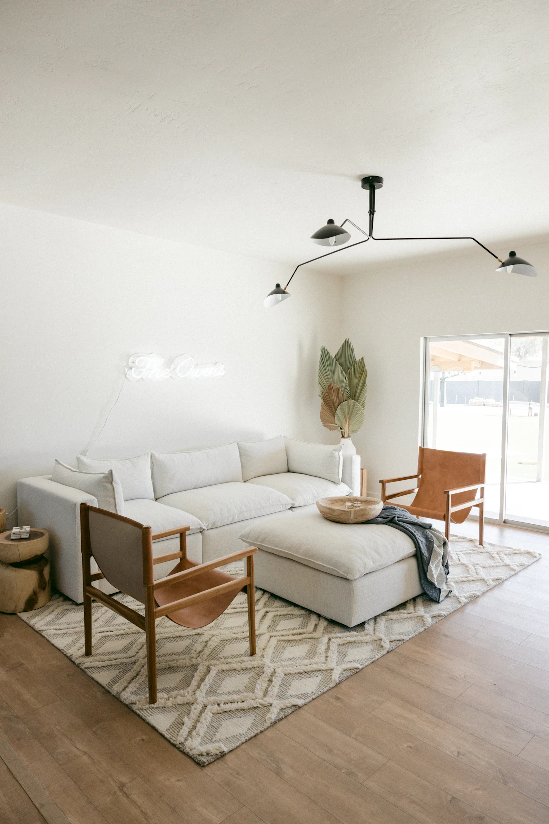 A bright, updated living room — the kind of home Y2K Solutions improves and brings back to market