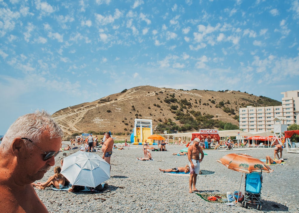 people on beach during daytime