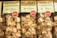 Several packages of Nougat de Montélimar are displayed, each containing multiple pieces of nougat wrapped in transparent plastic. The packages have labels featuring text and a red circular design with the word 'tendre'.
