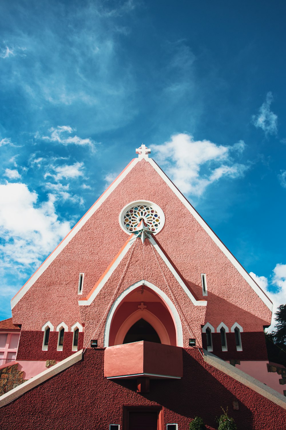 white and brown church under blue sky