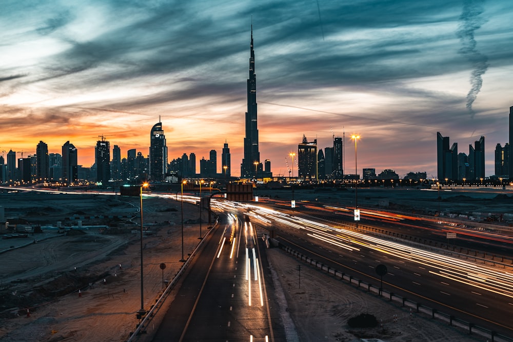 city skyline under cloudy sky during daytime