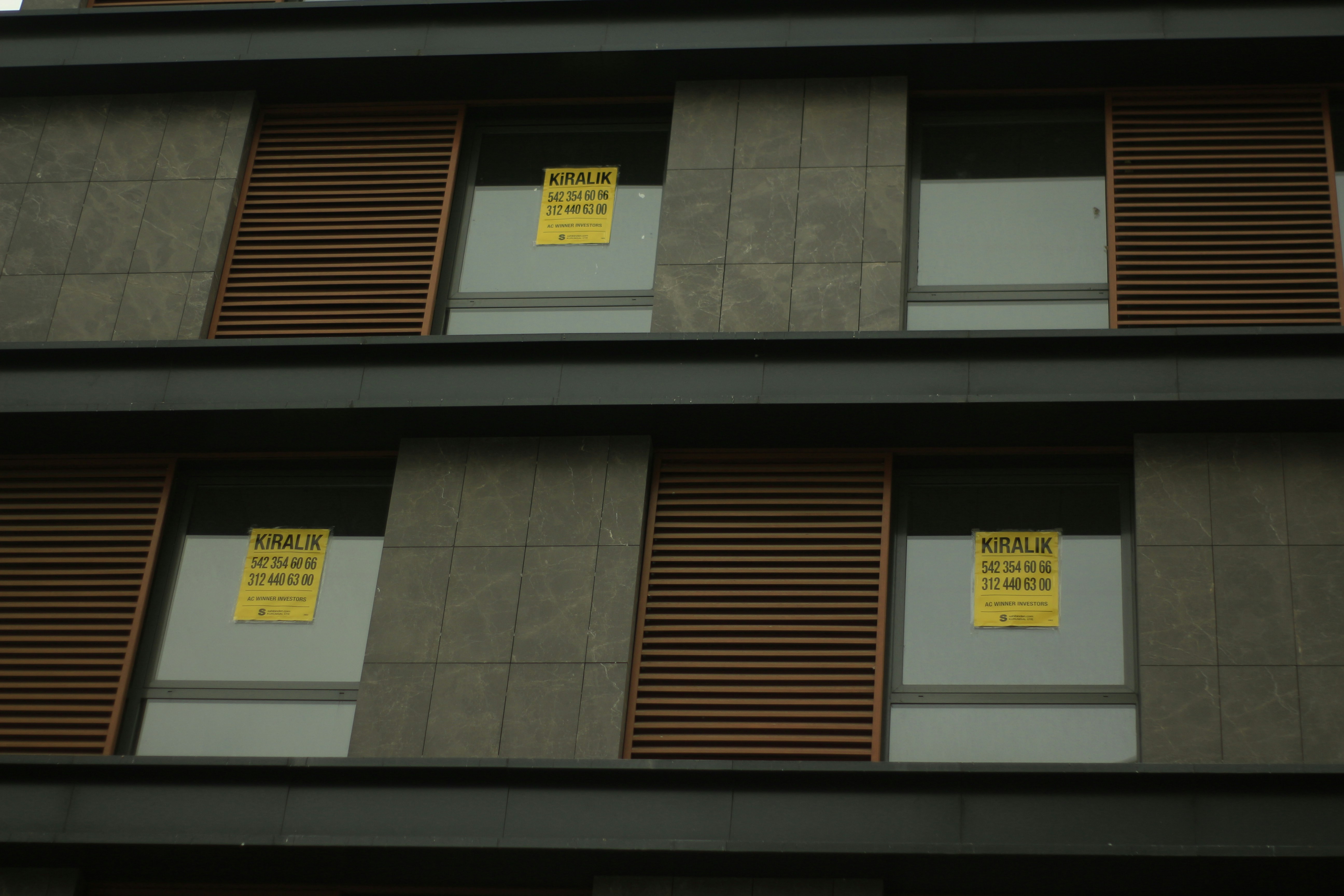 brown and white wooden window