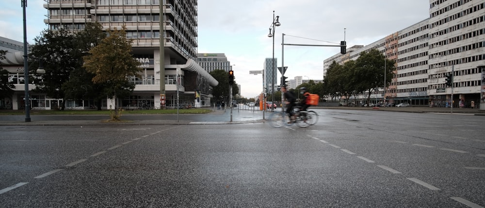 cars on road near buildings during daytime