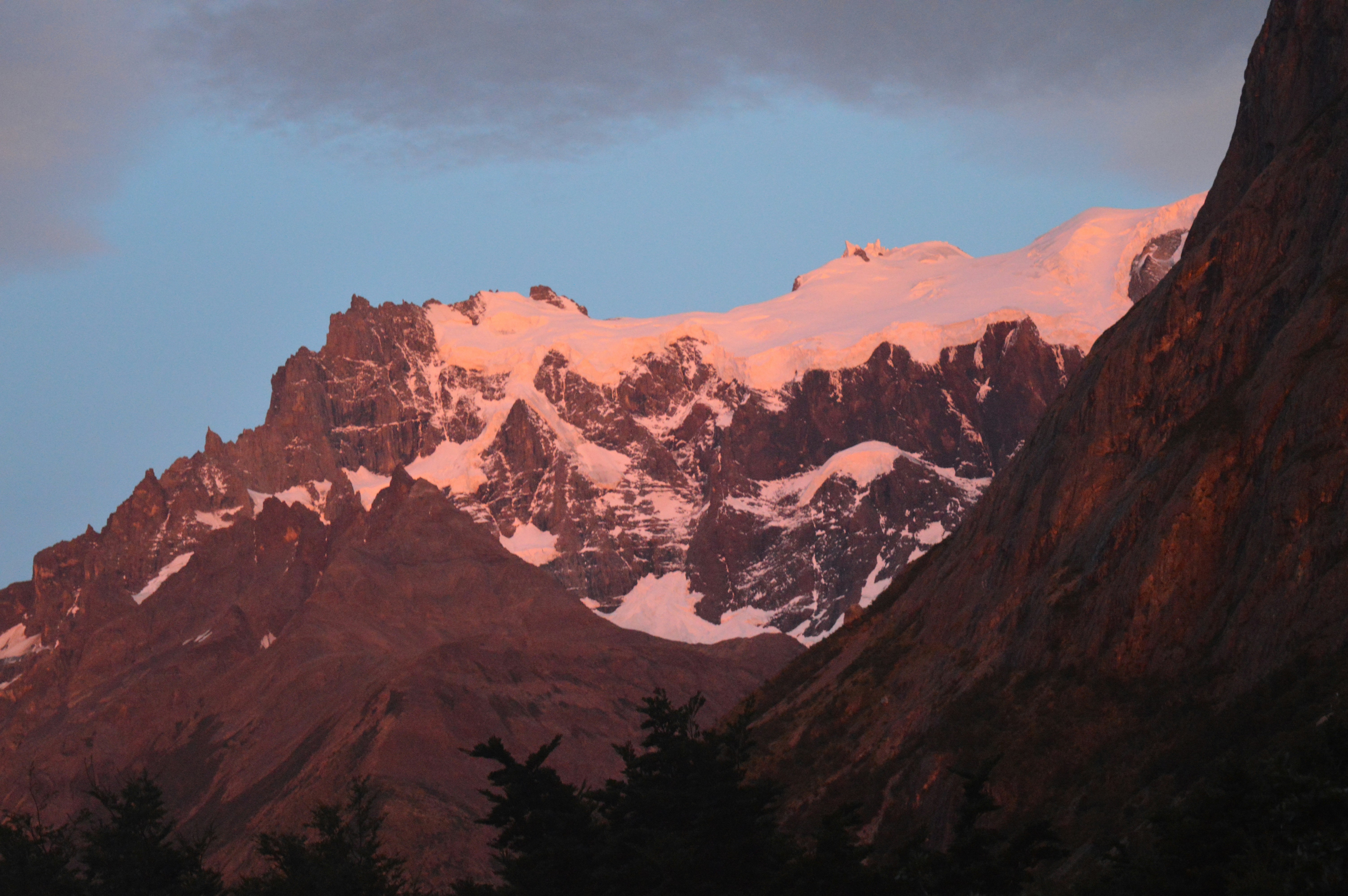 brown and white mountains under blue sky during daytime