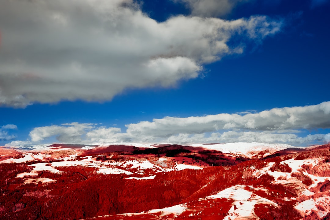 snow covered mountain under blue sky during daytime