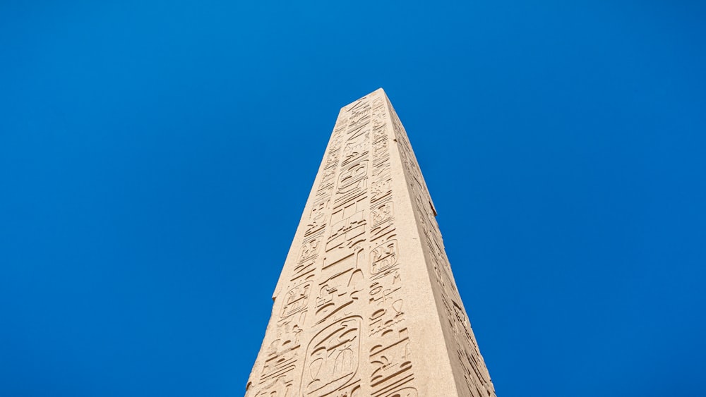 gray concrete tower under blue sky during daytime