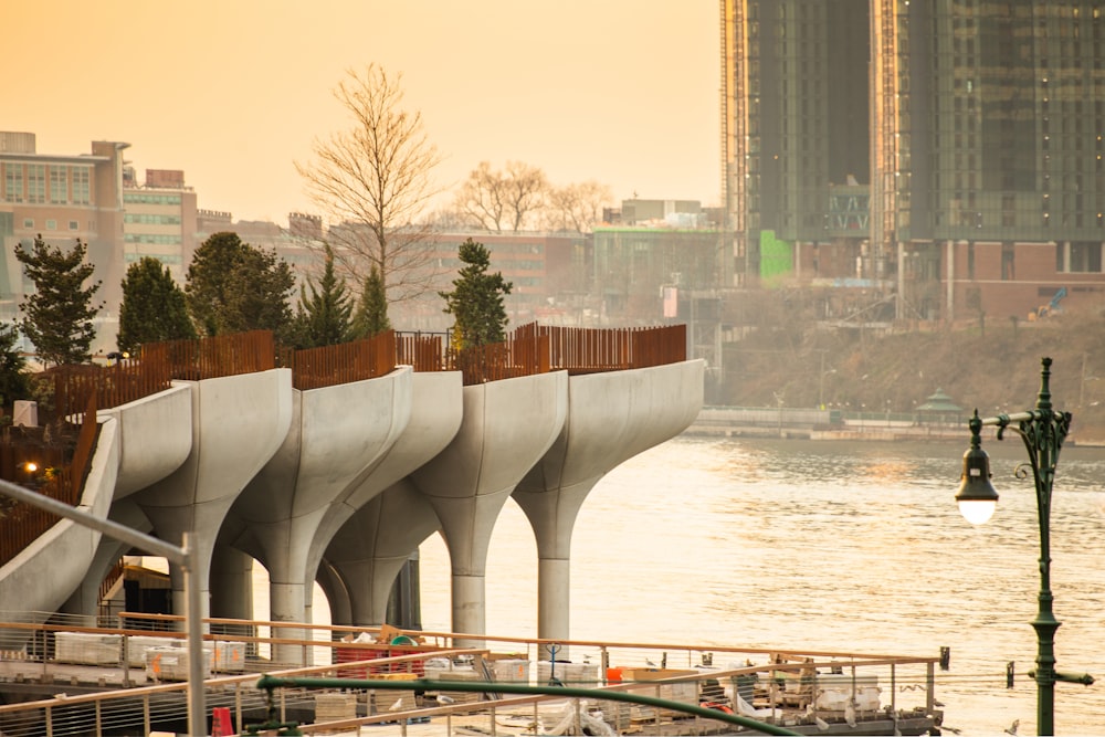 white concrete bridge over river during daytime