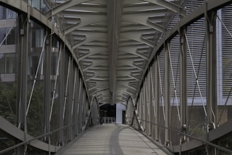 A modern pedestrian walkway supported by fiber reinforced polymer structural components.