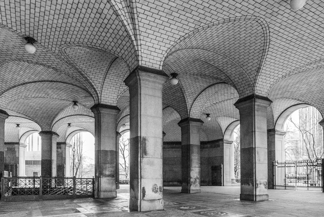 grayscale photo of concrete building