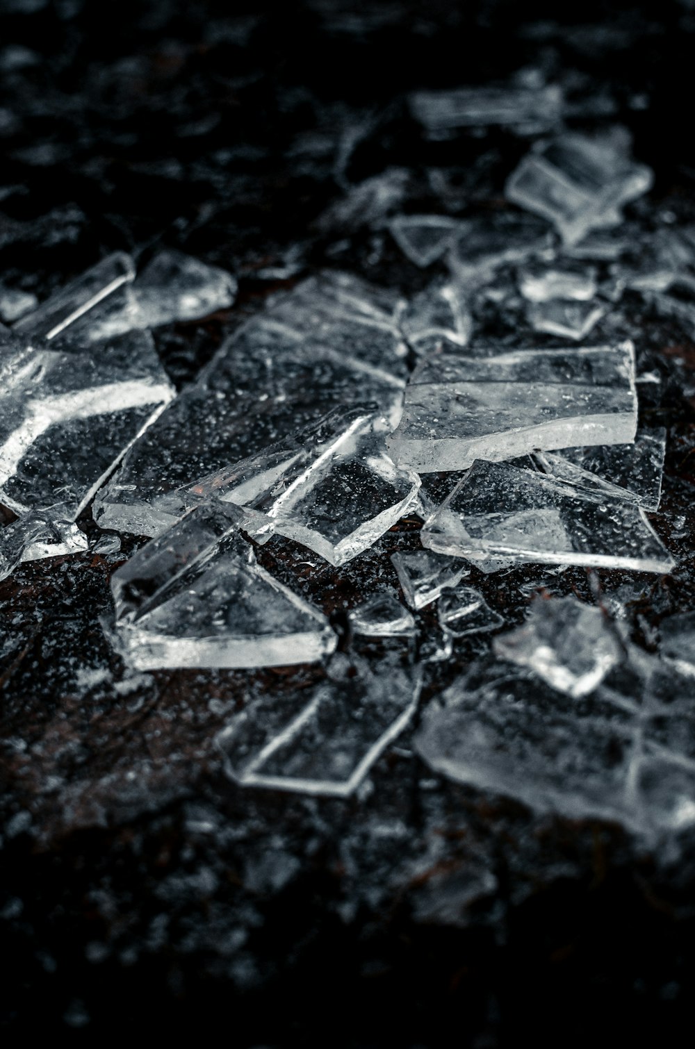 broken glass on black surface