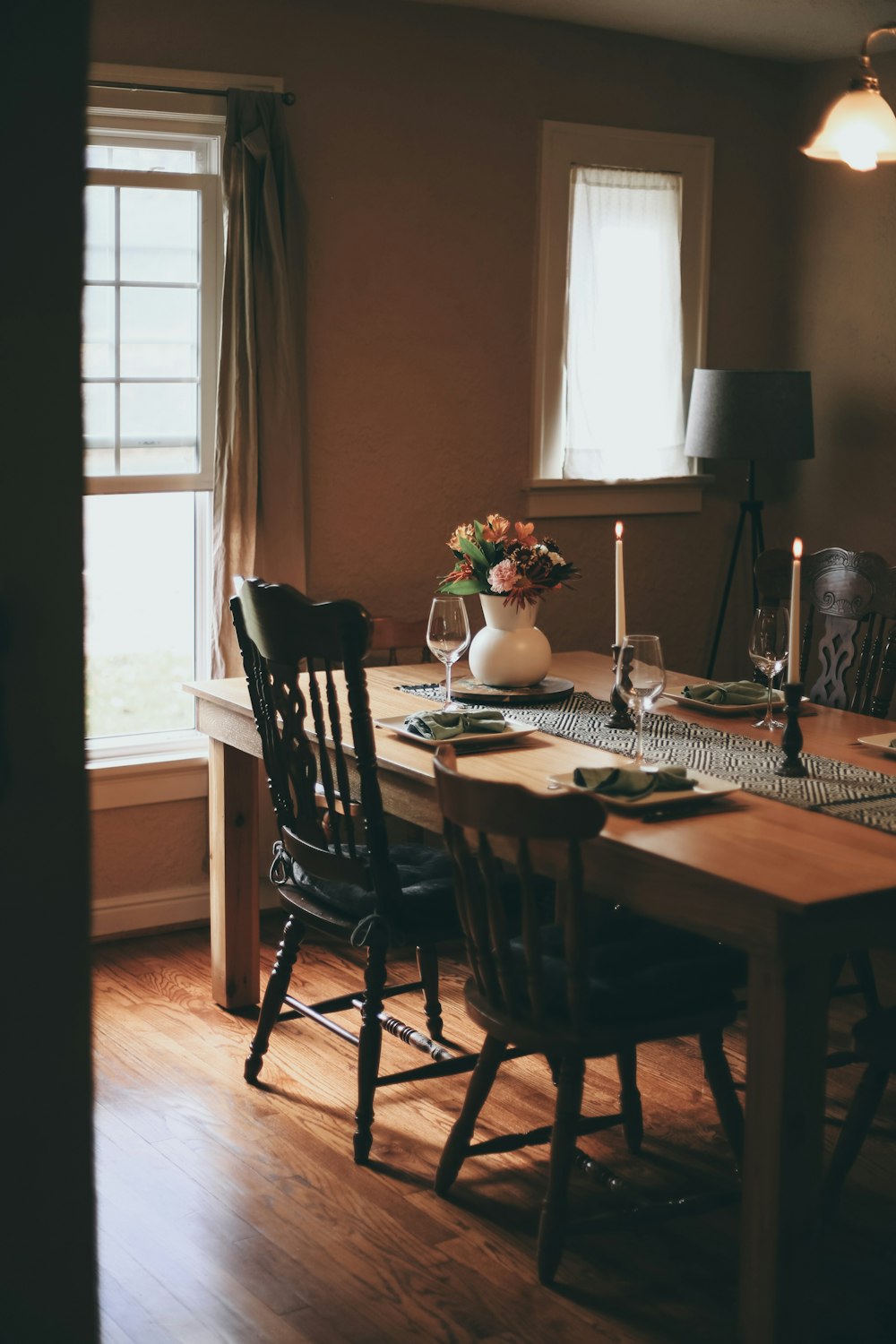 brown wooden table with chairs