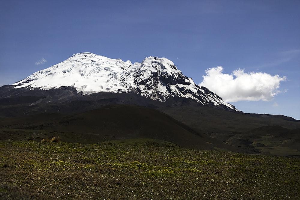 snow covered mountain under blue sky during daytime