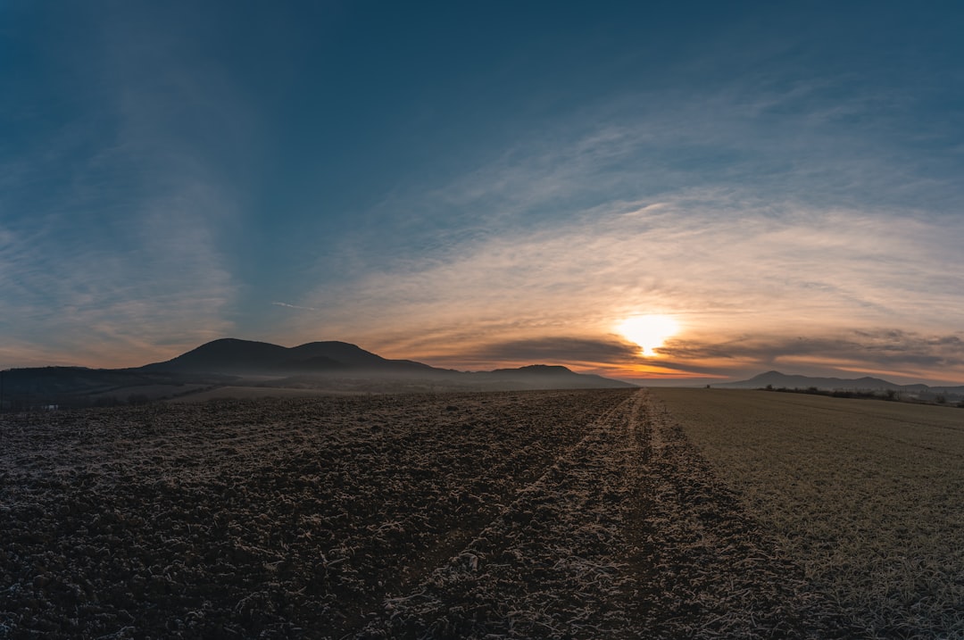 silhouette of mountain during sunset