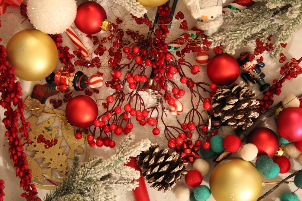 red and yellow baubles on green pine tree