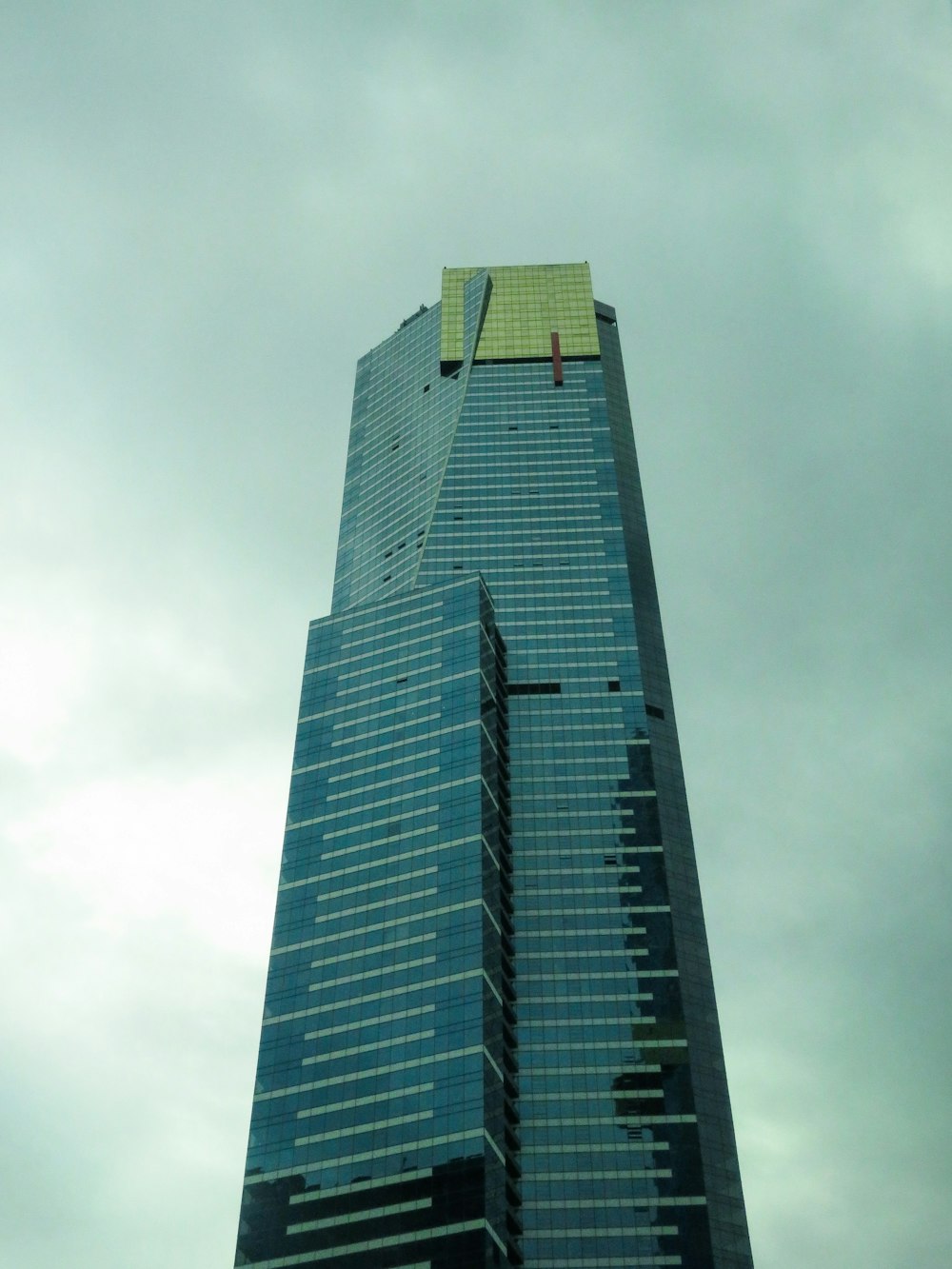 black high rise building under white sky