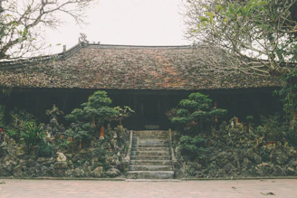Exterior view of Atmiya Niwas showing the welcoming entrance and garden.