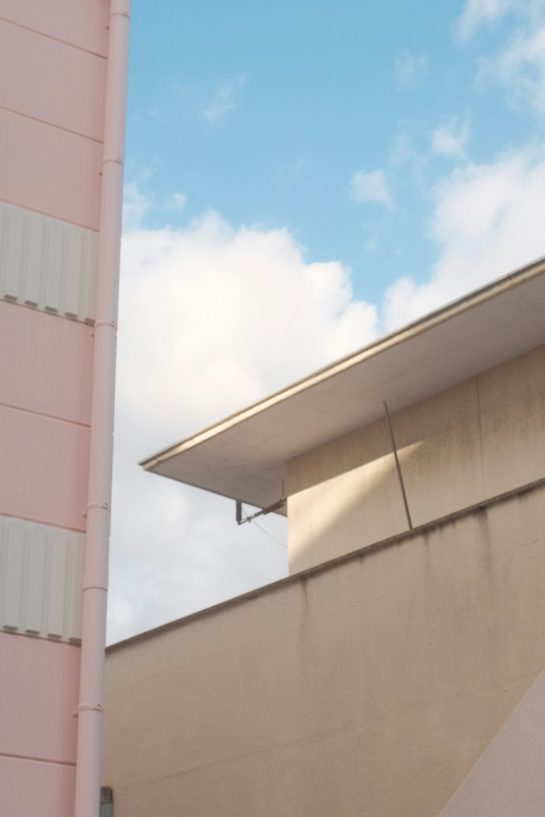 white concrete building under blue sky during daytime