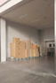 brown cardboard boxes on white floor tiles