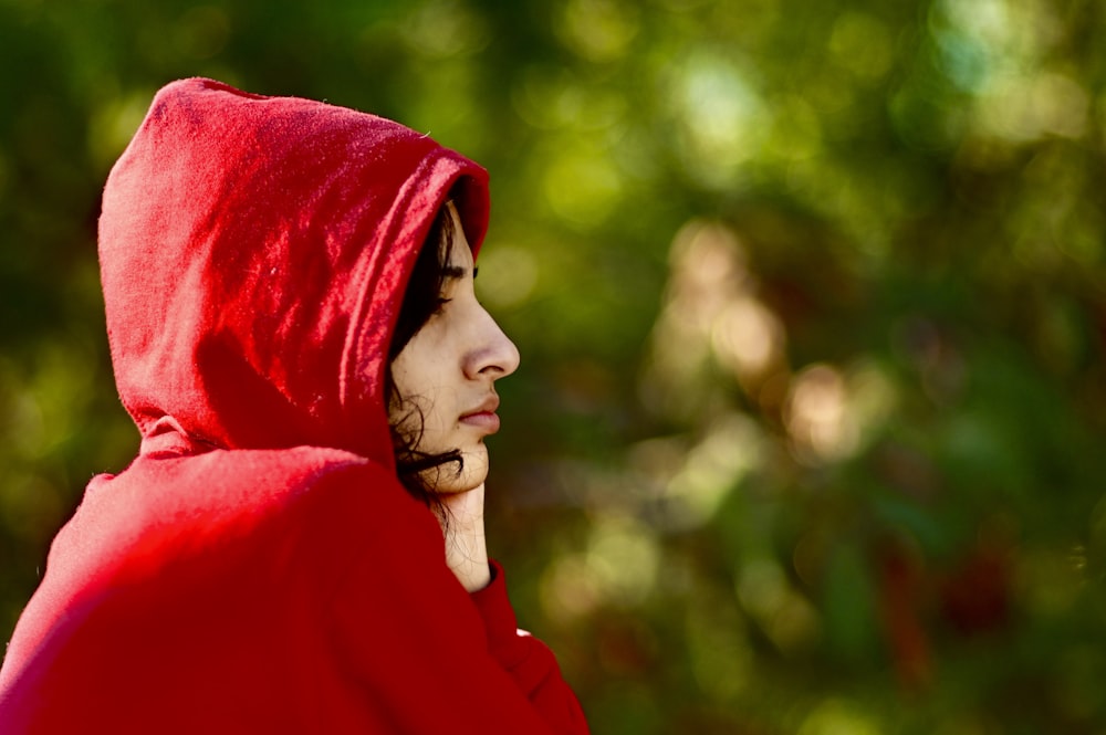 woman in red hoodie wearing red hoodie