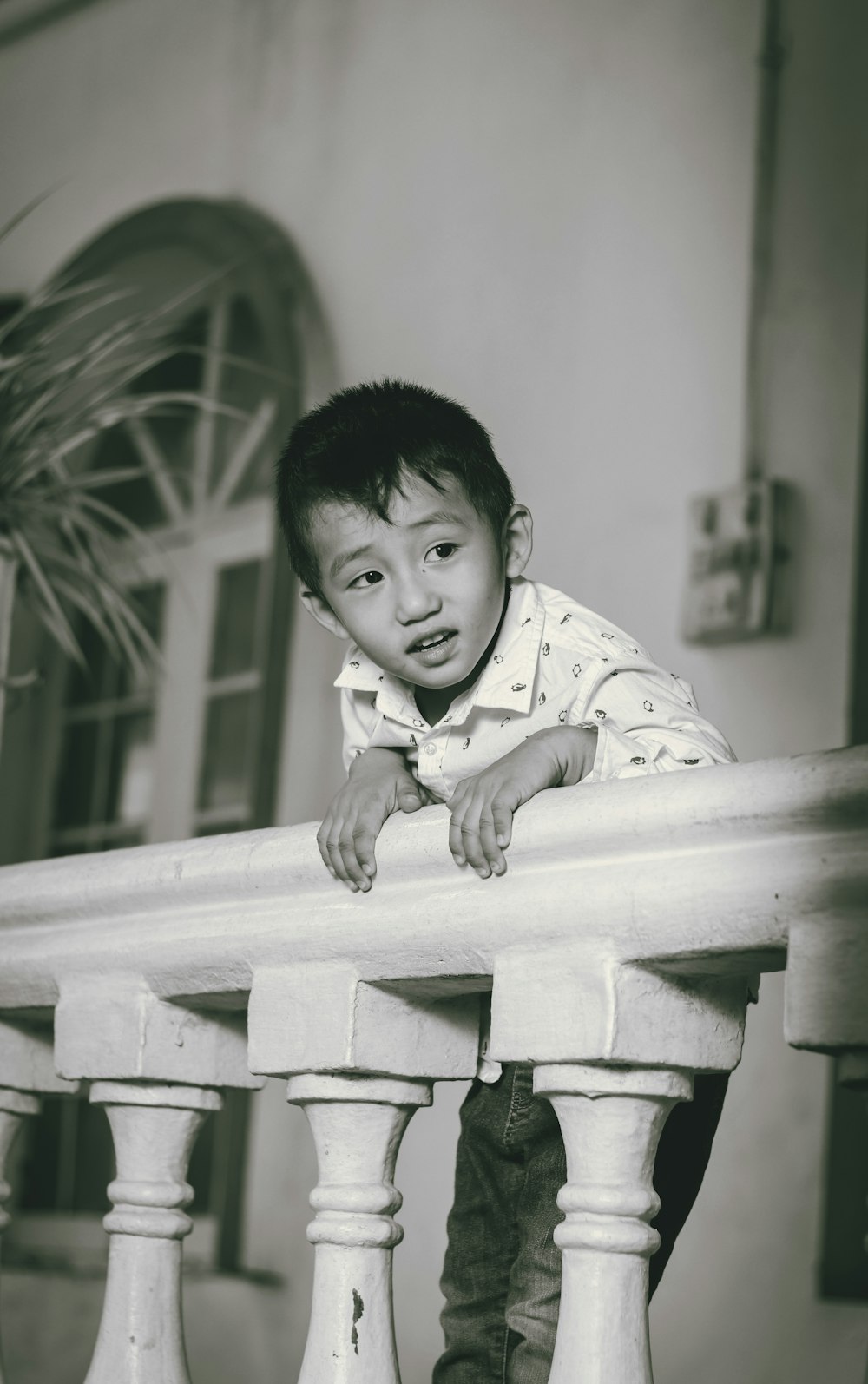 boy in white and black long sleeve shirt