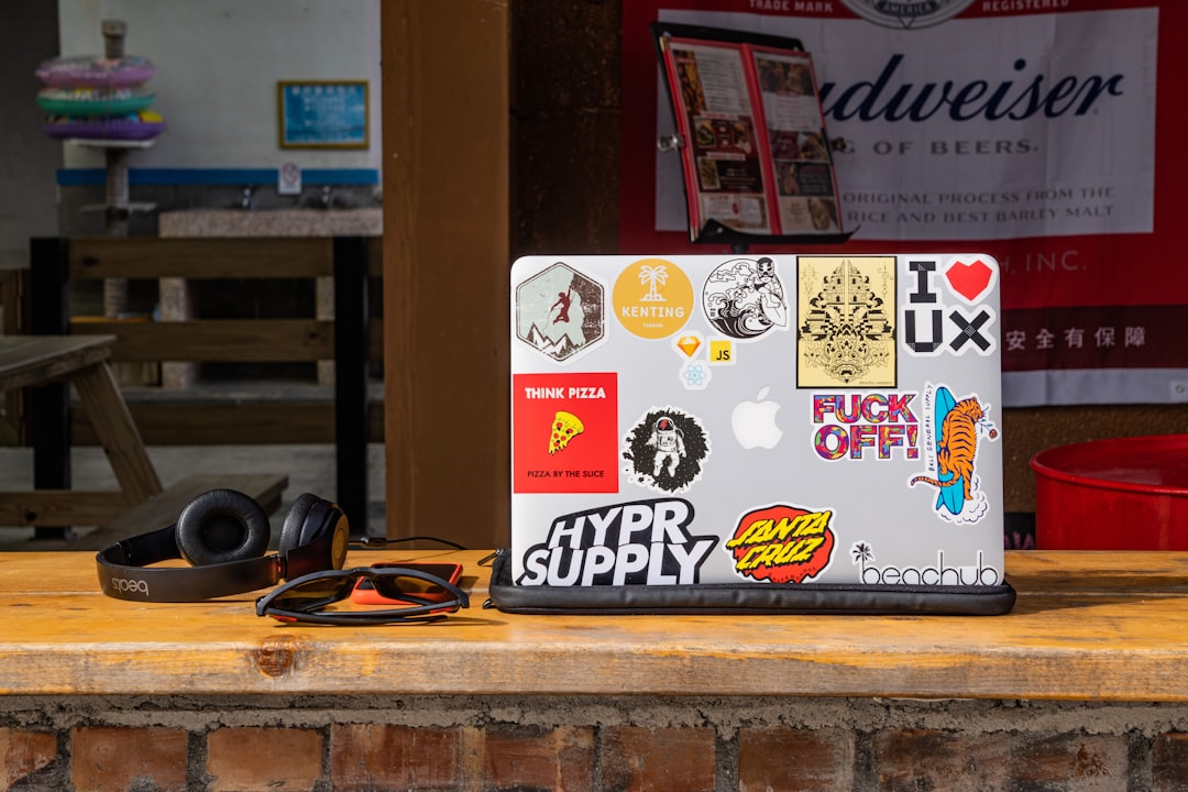 text, Laptop in outdoor workspace