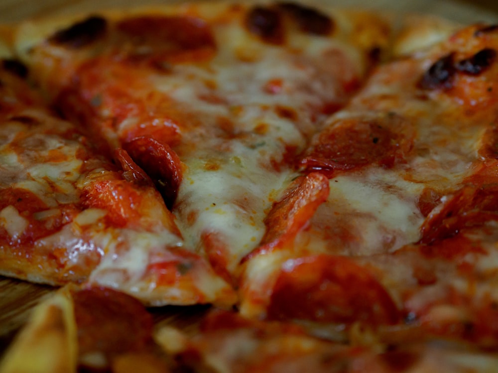 pepperoni pizza on white ceramic plate