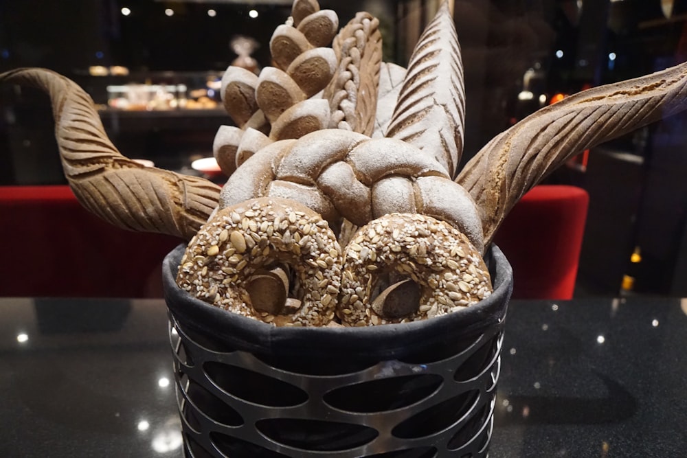 brown bread in black and white ceramic bowl