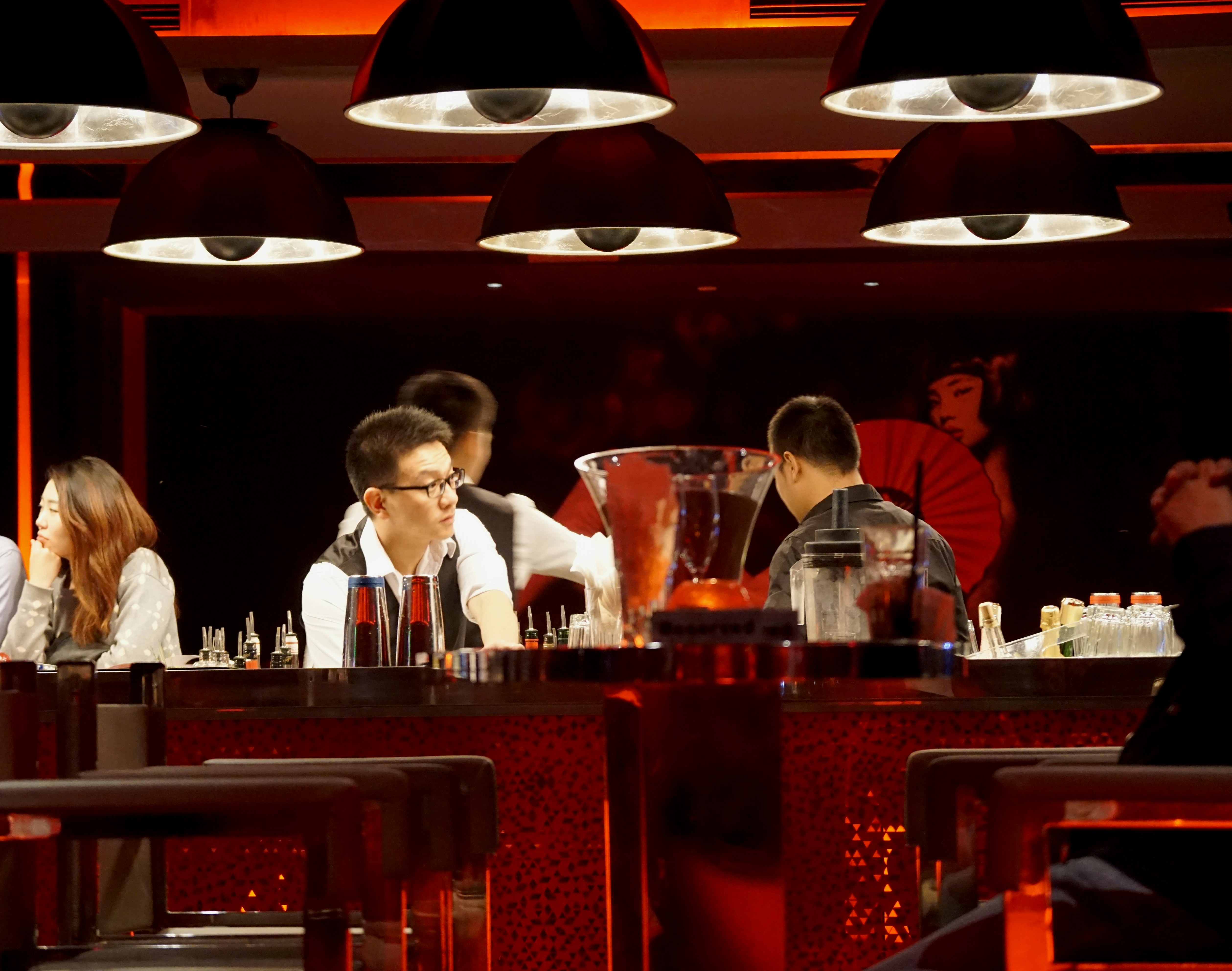 people standing in front of table