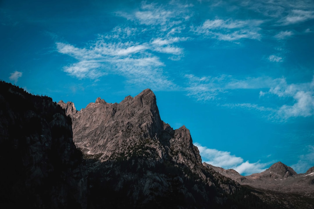 brown rocky mountain under blue sky during daytime