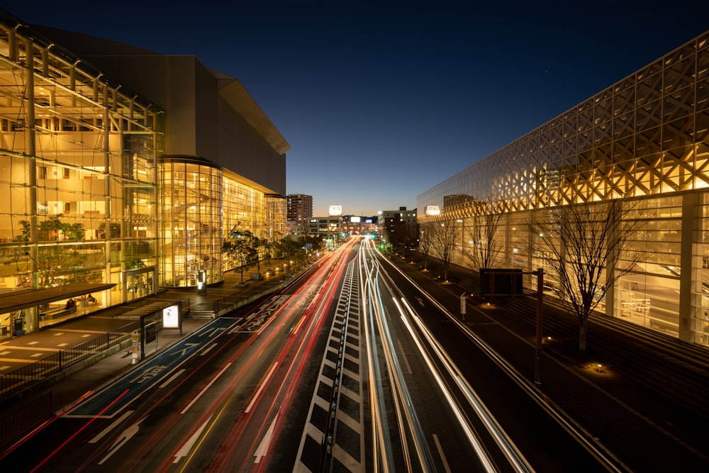 time lapse photography of cars on road during night time