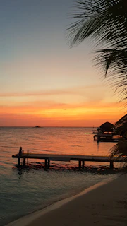 Sunset view over the ocean from a luxury penthouse balcony at The Landing Fiji