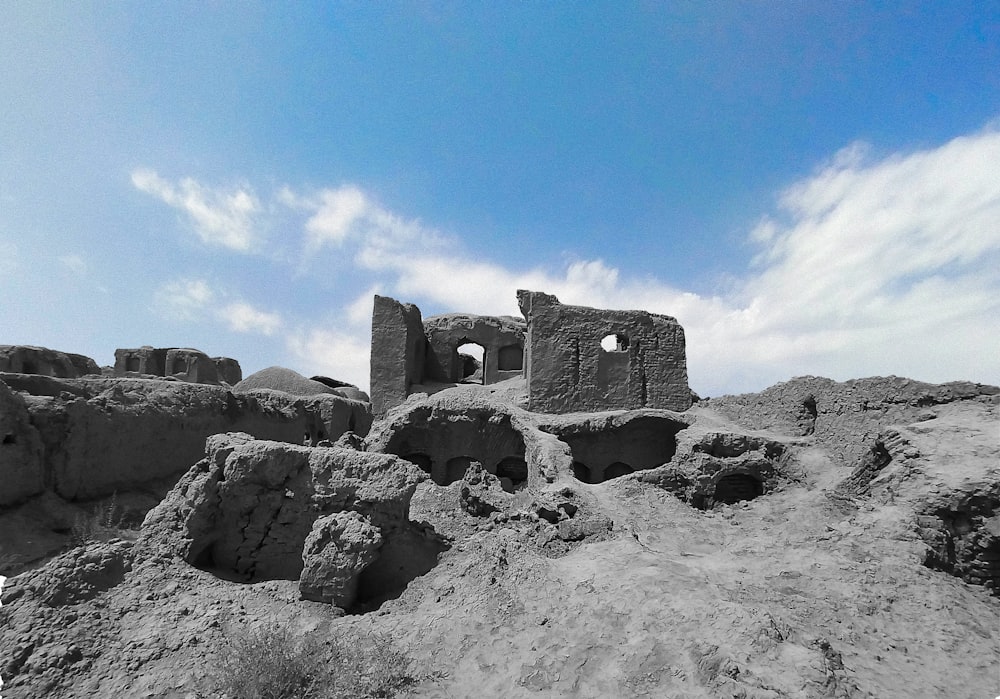 gray rock formation under blue sky during daytime