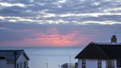 Scenic view of a beautiful seaside home in Mallorca at sunset.