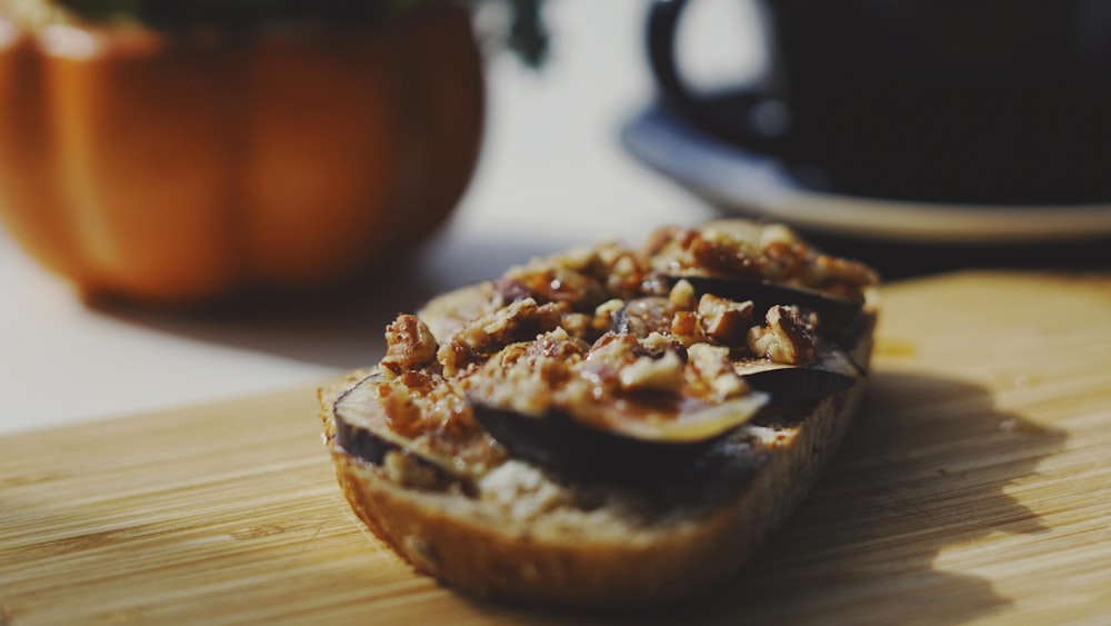 bread with chocolate and peanut butter on brown wooden table