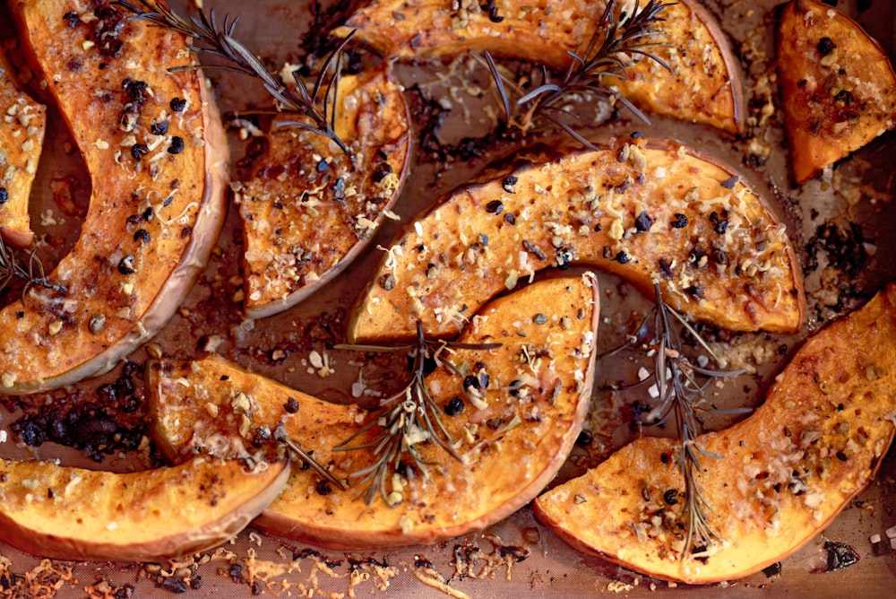 sliced fruit on brown wooden surface