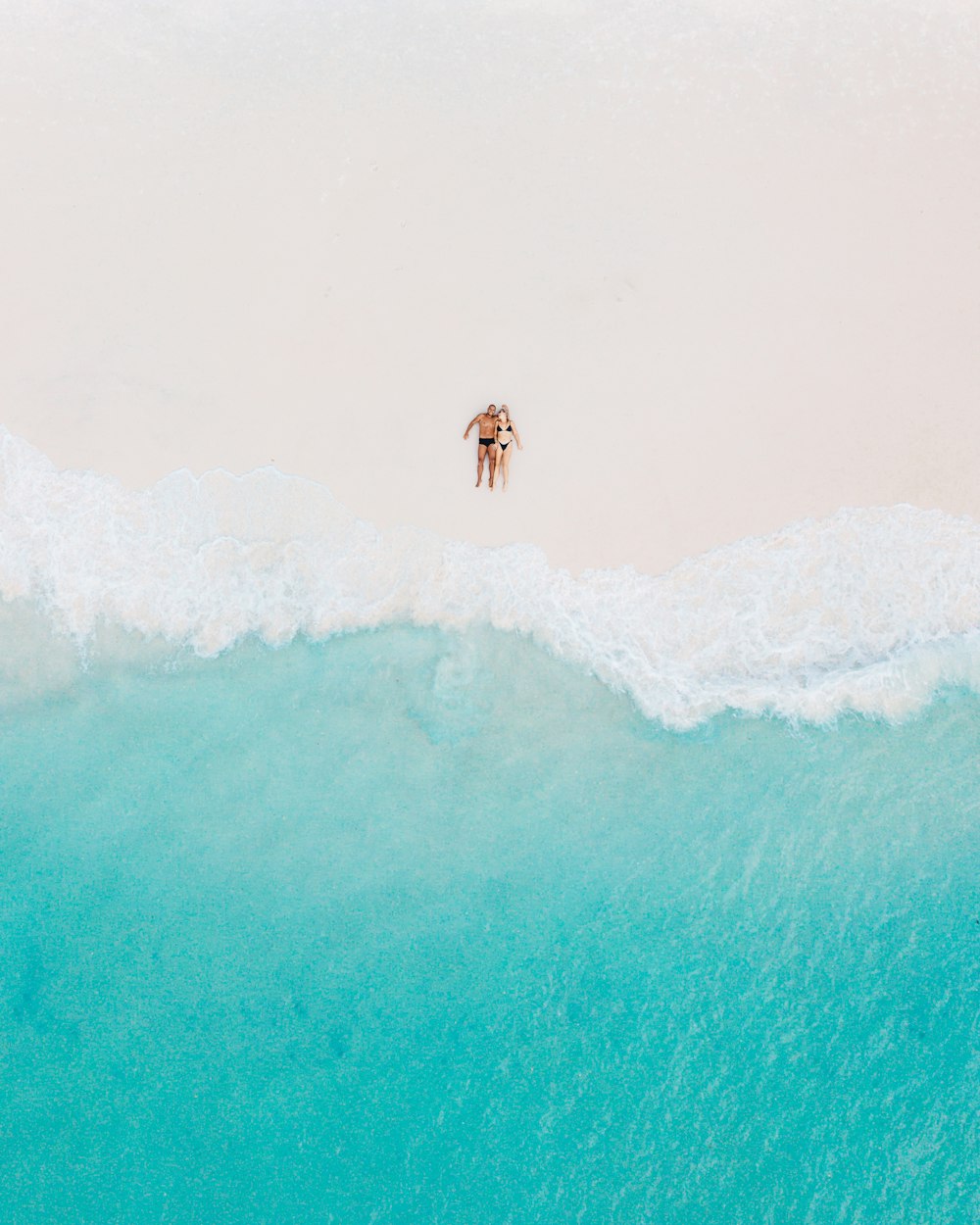 person surfing on sea waves during daytime