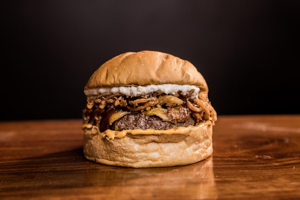 burger on brown wooden table