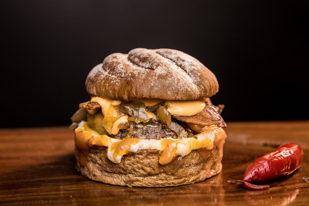 burger on brown wooden table