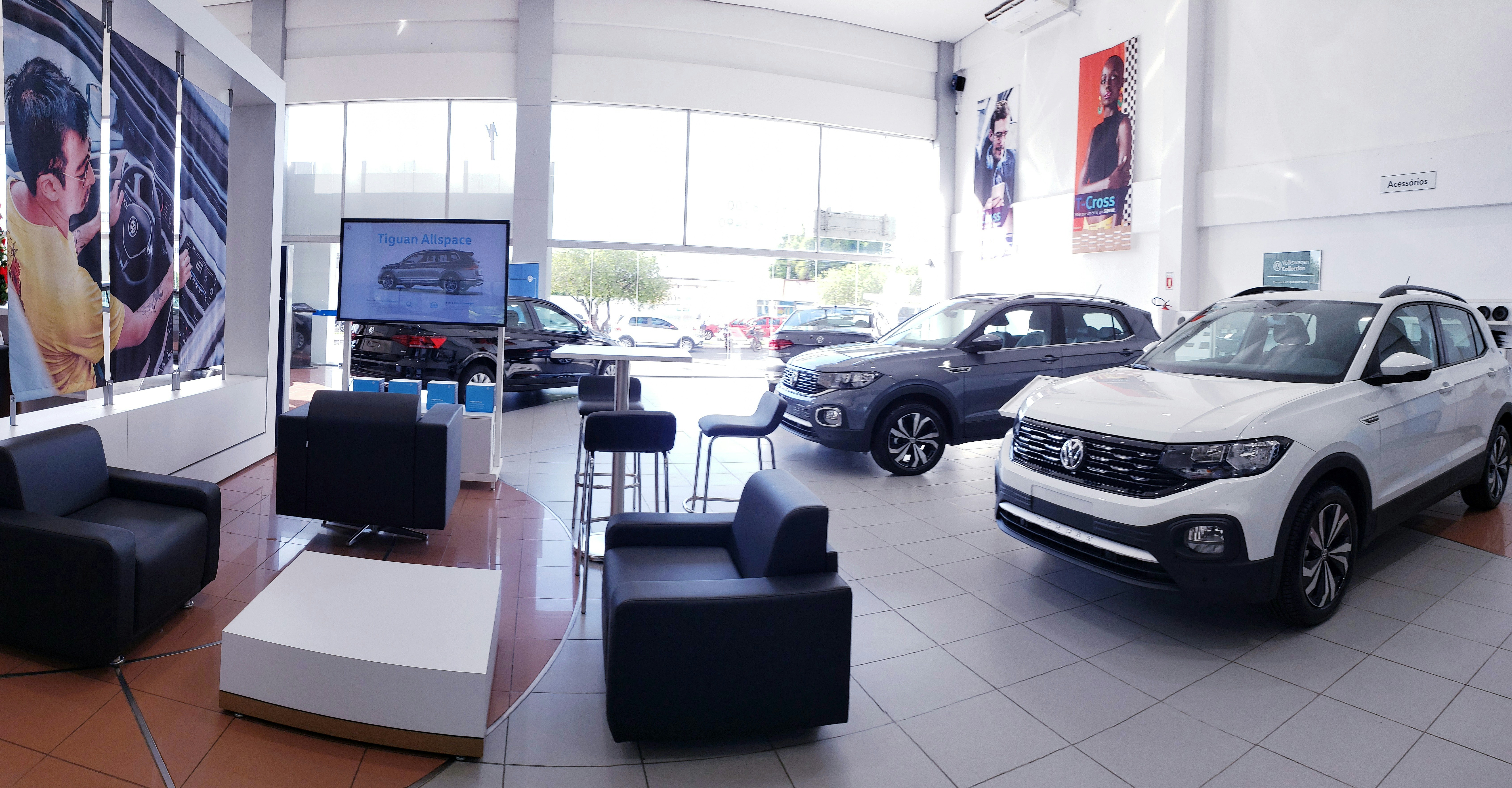 Volkswagen Golf in white, clean bright showroom, well-lit neutral background