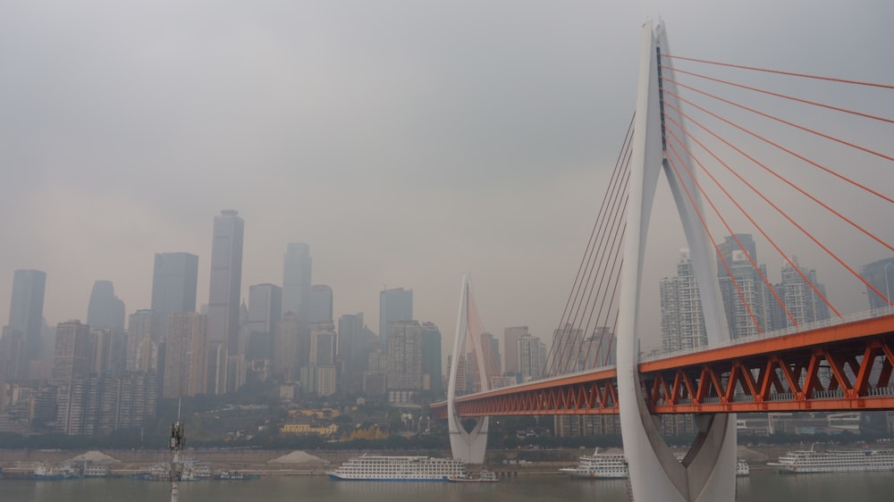 white bridge over body of water during daytime