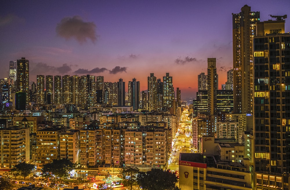 city skyline during night time