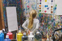 a woman standing in front of a store