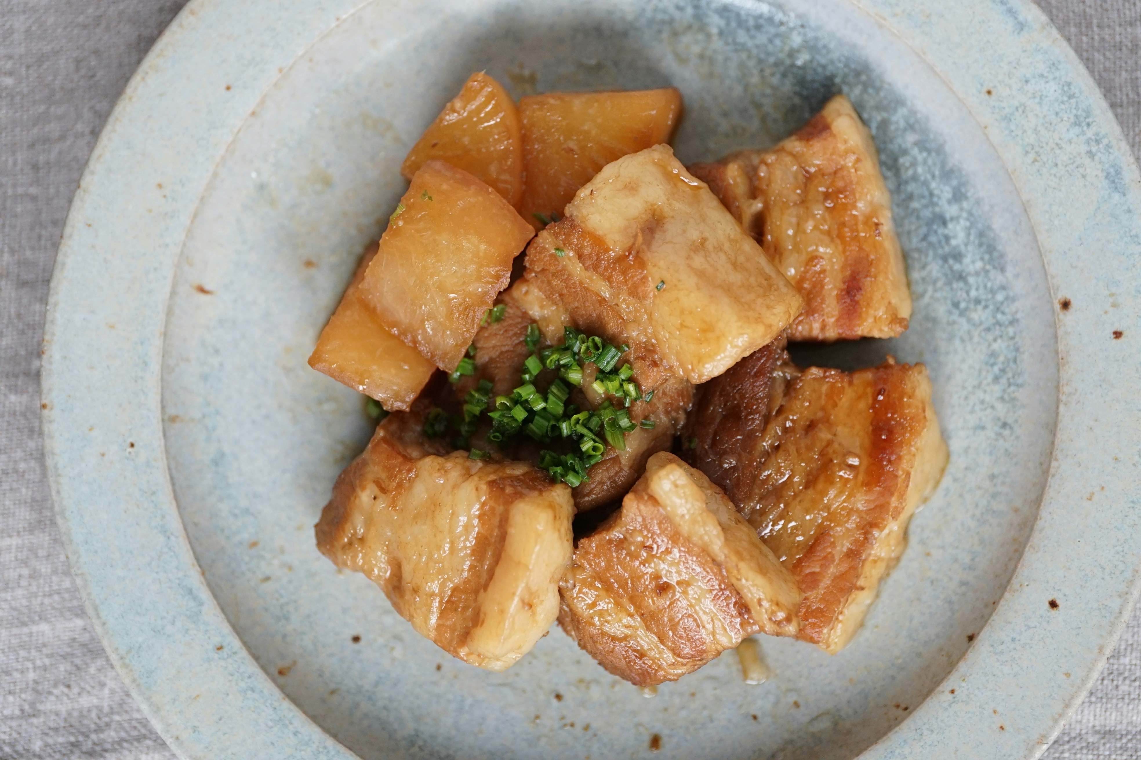 brown food on white ceramic plate
