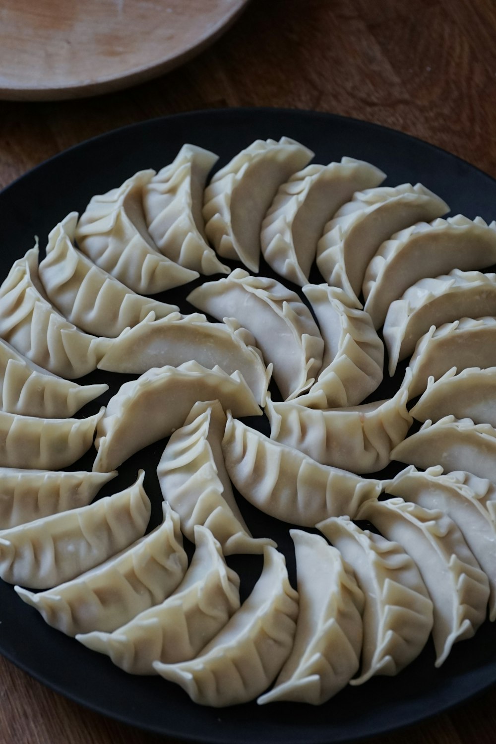 white and black round ceramic plate