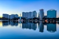 city skyline across body of water during daytime