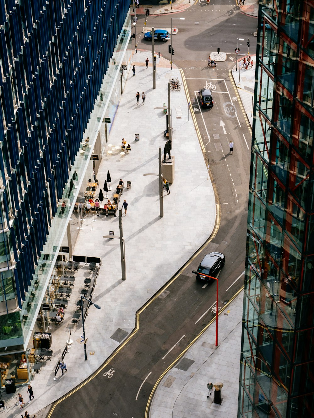 cars on road near buildings during daytime