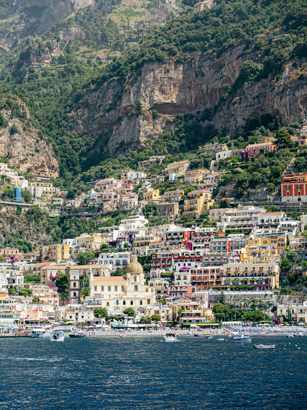 houses near body of water during daytime