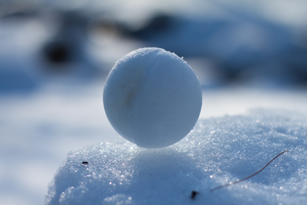 white round ornament on white surface