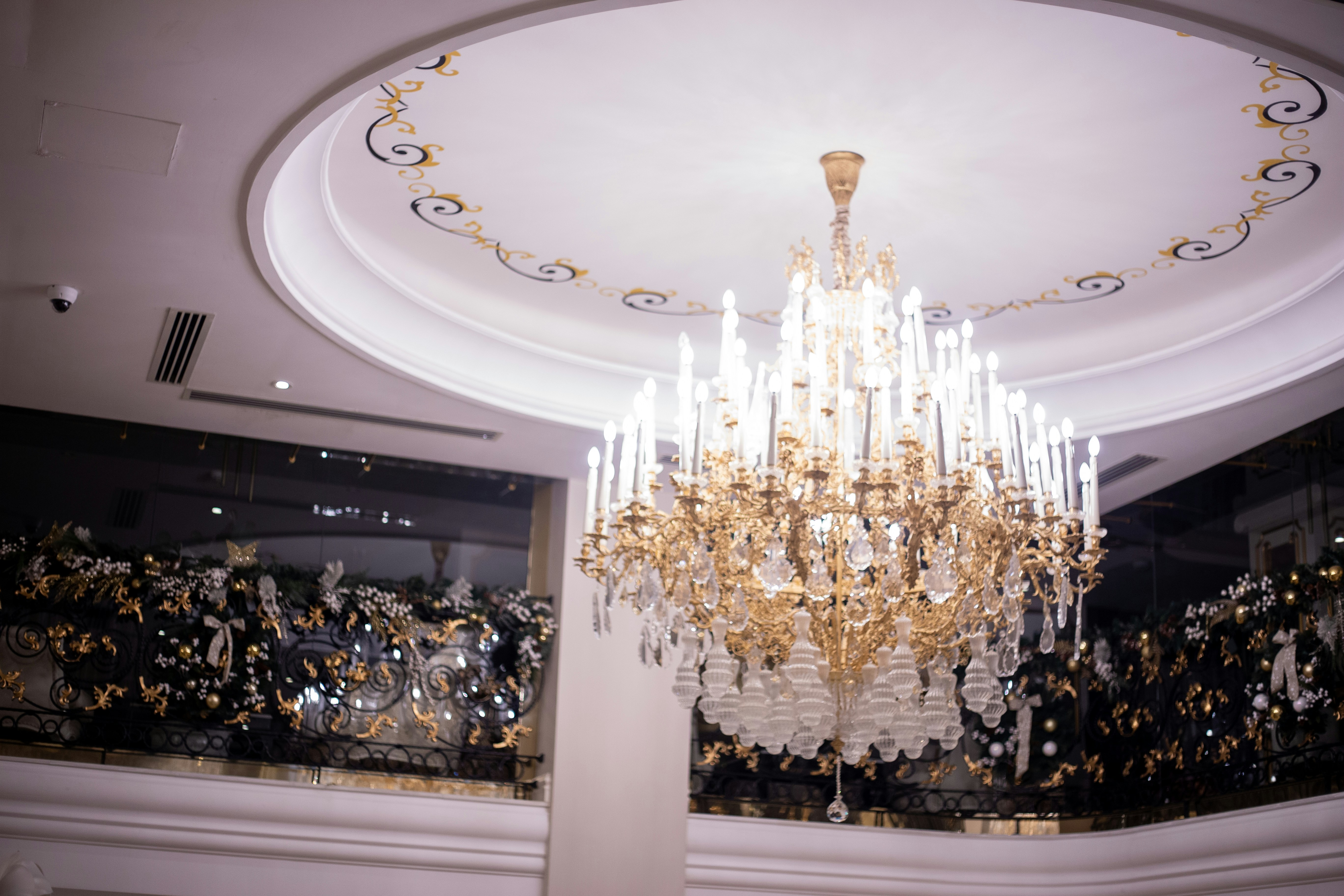 Gold and white uplight chandelier